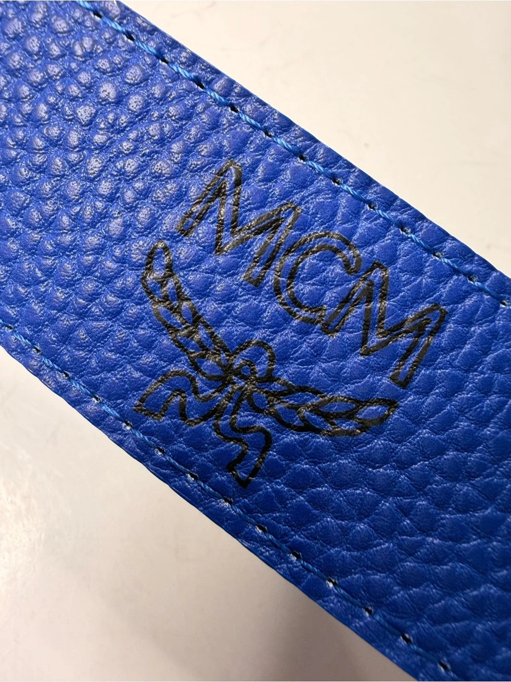 MCM Claus Reversible Belt with Blue Pebbled Leather and Gold-Tone M Buckle